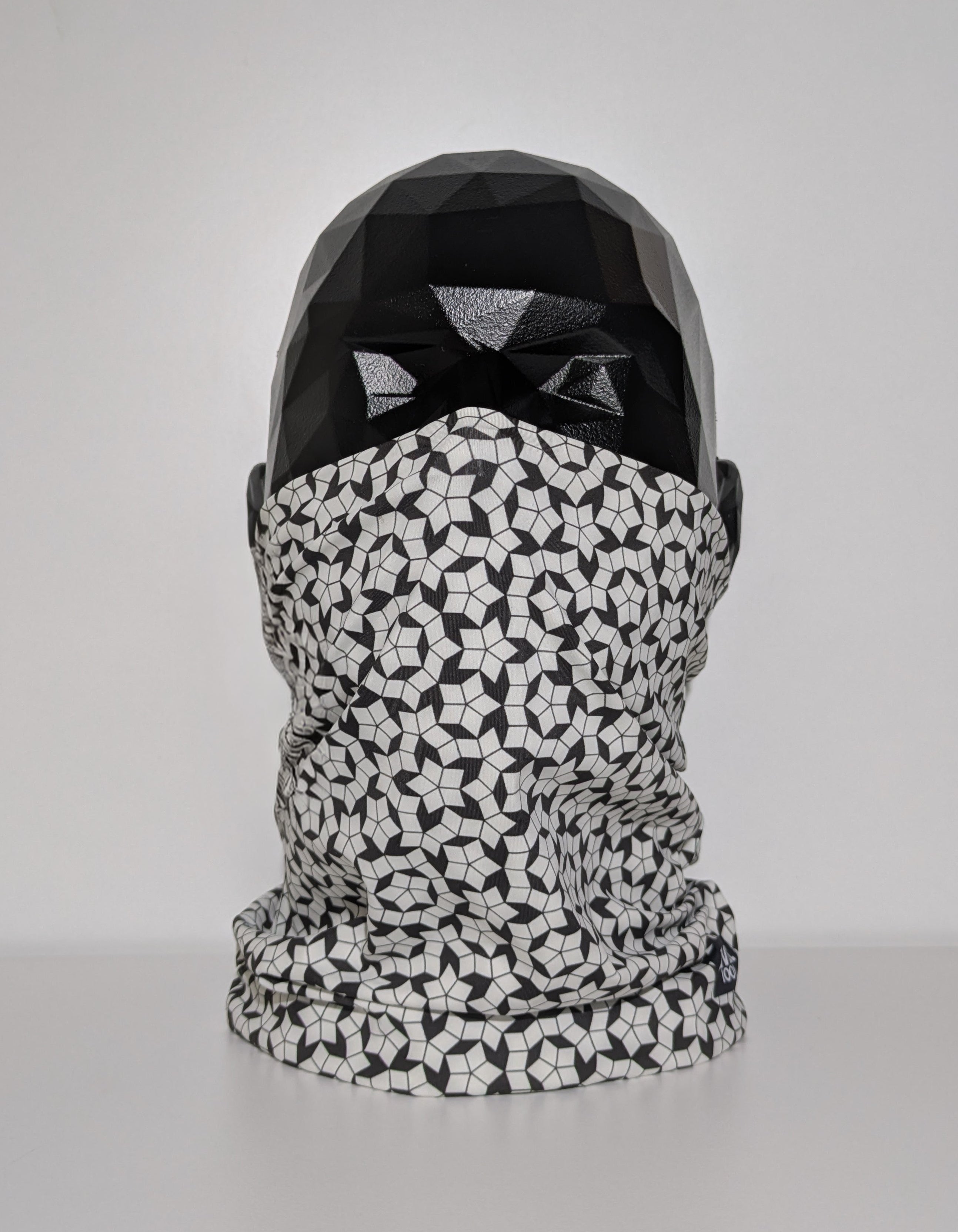 level 0002 model neckwear on mannequin head.