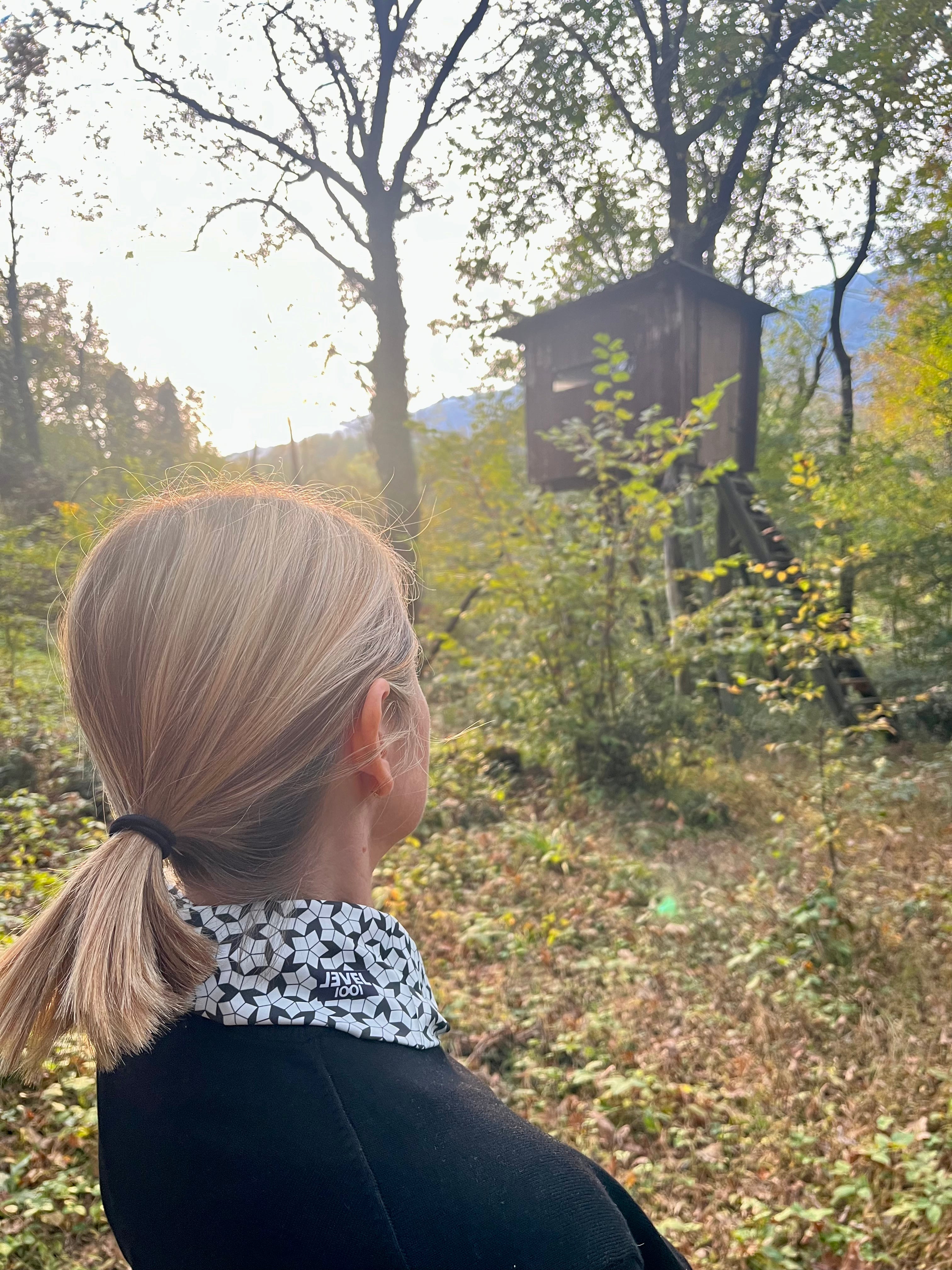 woman wearing a geometric neckwear in the countryside