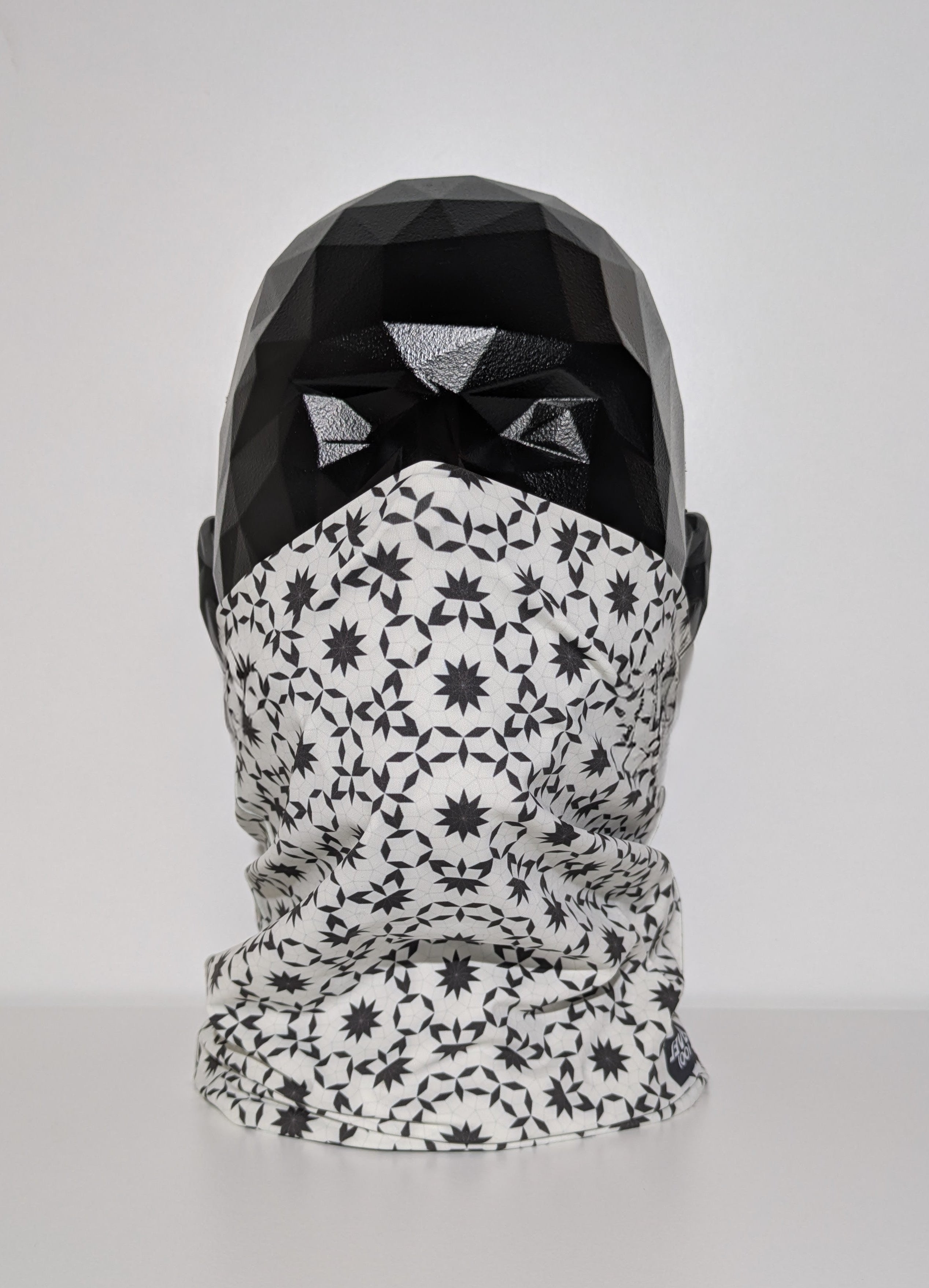 level 0003 model neckwear on mannequin head.